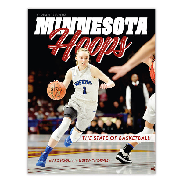 A basketball player in a blue Hopkins uniform dribbles on the court. The magazine cover reads "Minnesota Hoops, Revised Edition: The State of Basketball," celebrating Minnesota basketball history by Marc Hugunin & Stew Thornley.