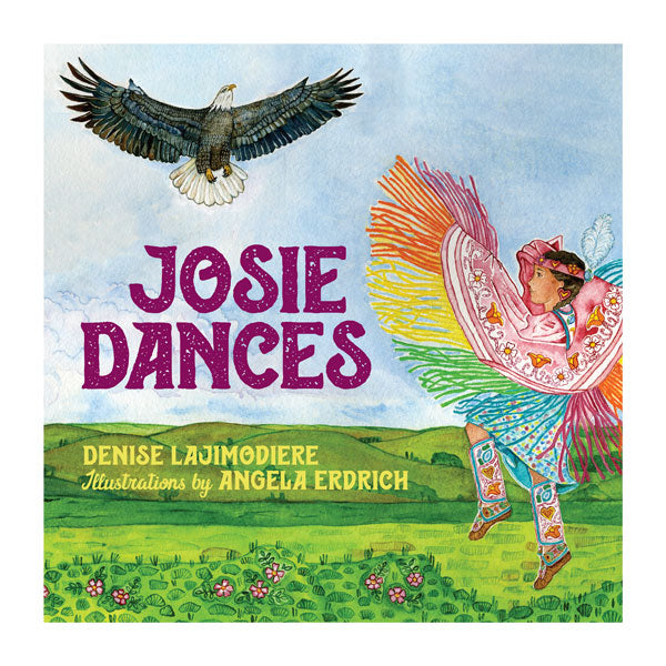 The cover of Josie Dances, a Native American children’s book, features a young girl dressed in vibrant regalia dancing on grass at an Ojibwe powwow. An eagle soars above her against a backdrop of rolling hills and blue sky. The cover also displays the names of the author, Denise Lajimodiere, and illustrator, Angela Erdrich.