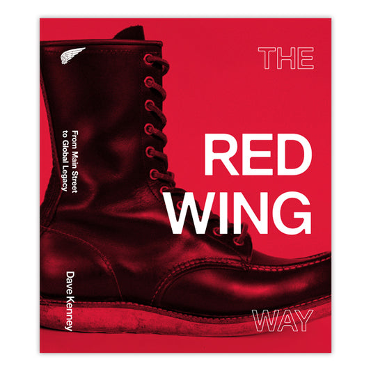 A black leather lace-up boot is set against a red background. Large white text reads "The Red Wing Way," with smaller text, “From Main Street to Global Legacy,” celebrating the durable footwear of Red Wing Shoe Company.