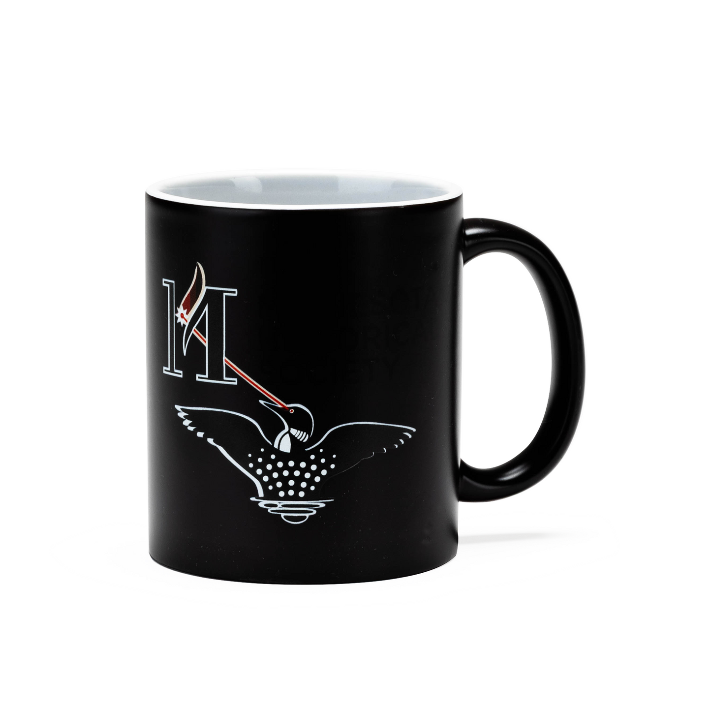 Laser Loon Mug Color Changing featuring a black exterior that reveals a minimalist design with a white letter H, red and white feather, and a stylized Laser Loon adorned with dotted wing patterns. Inspired by the Minnesota Historical Society, this mug showcases the striking imagery against a plain background.