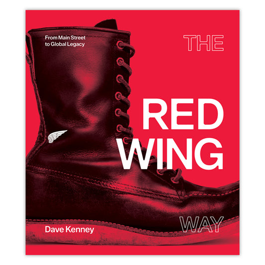 A black leather lace-up boot is set against a red background. Large white text reads "The Red Wing Way," with smaller text, “From Main Street to Global Legacy,” celebrating the durable footwear of Red Wing Shoe Company.